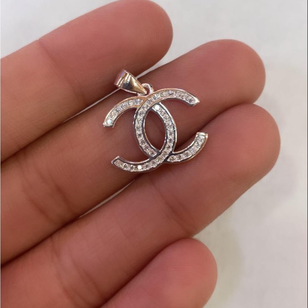 Sterling silver. Handmade with zirconias.